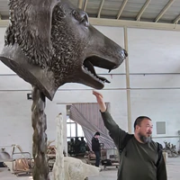 click 4 full view Ai Weiwei with Zodiac Head: Bronze Dog at the foundry in Chengdu, China in 2010